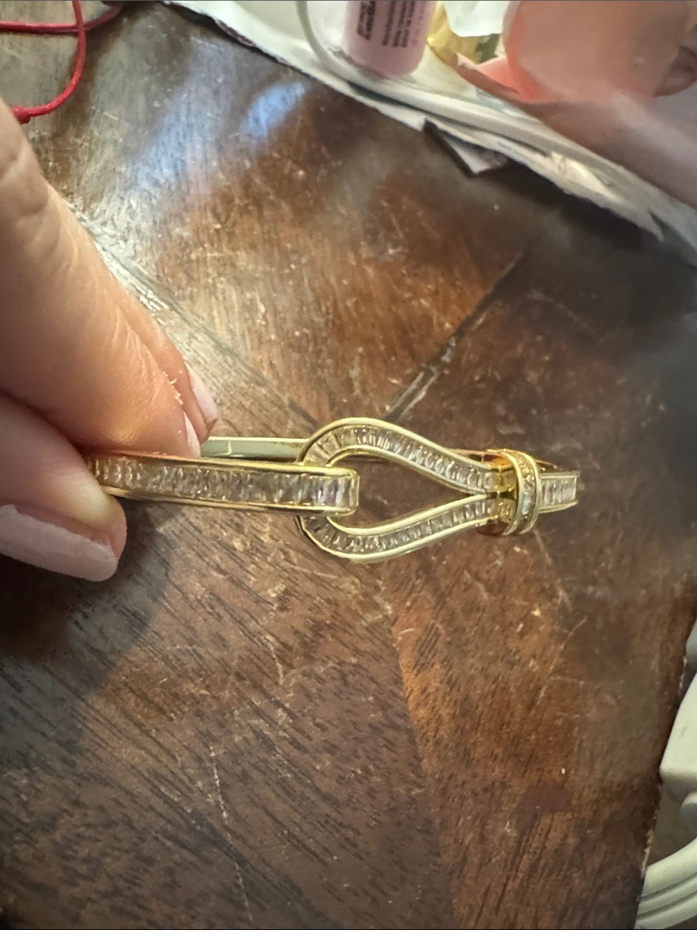 Gold-Tone Knot Hinged Bracelet with Clear Stone Accents